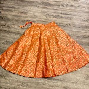 Orange and gold lengha choli chanya